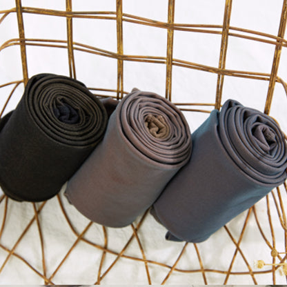 SheerSnug tights rolled, color options